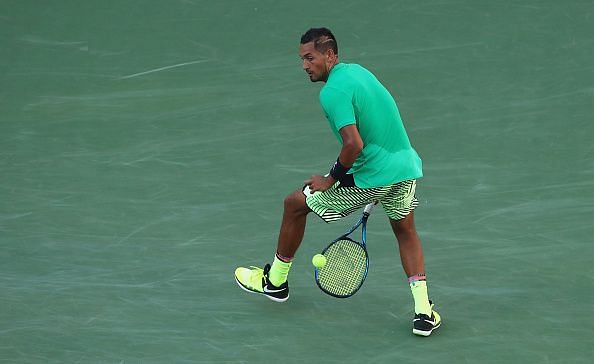 Nick Kyrgios hitting a tweener