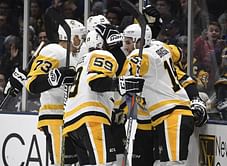 Guentzel helps Penguins top Islanders 2-1