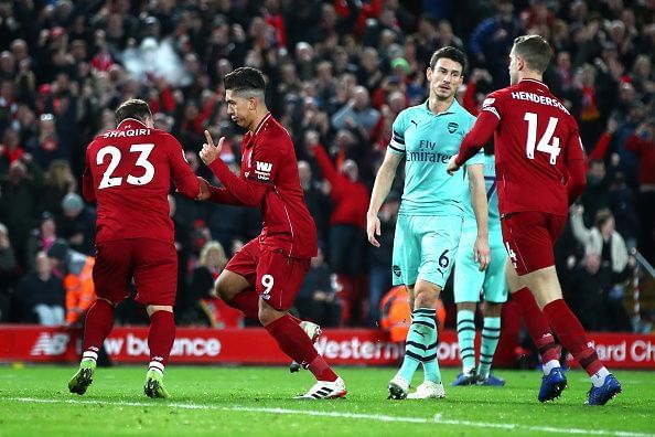 Firmino celebrates his third