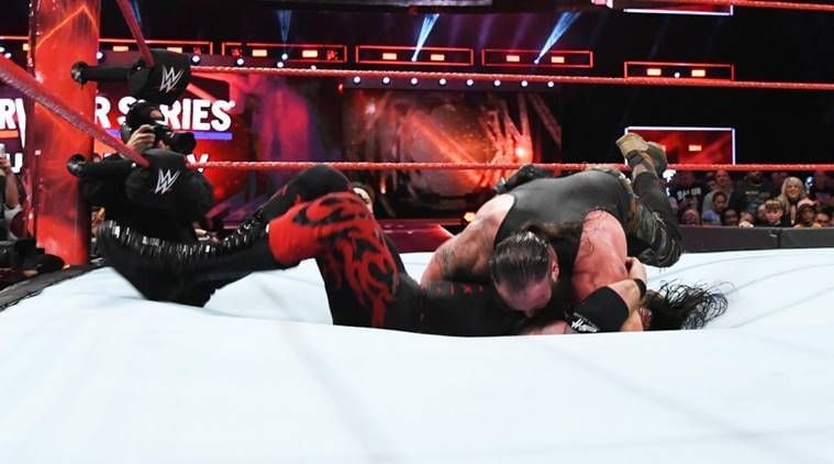 Strowman slams Kane through the matt