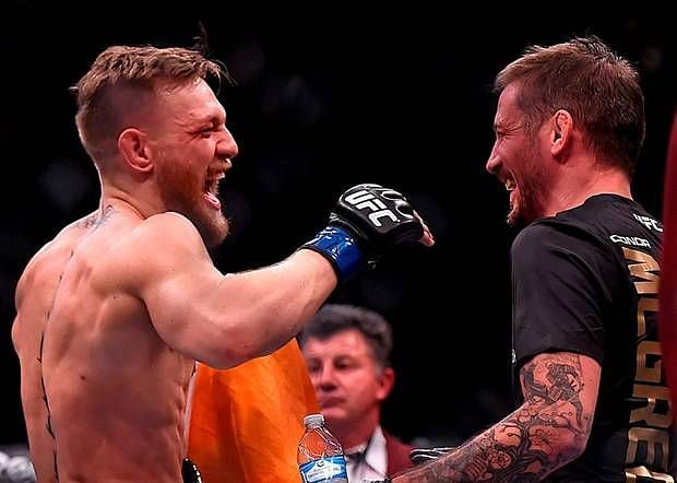 Conor McGregor (left) with John Kavanagh (right)