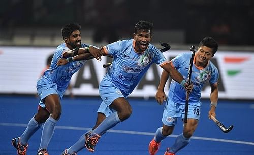 Odisha player Amit Rohidas scores India's fourth goal on his home ground against Canada in FIH Men's Hockey World Cup 2018