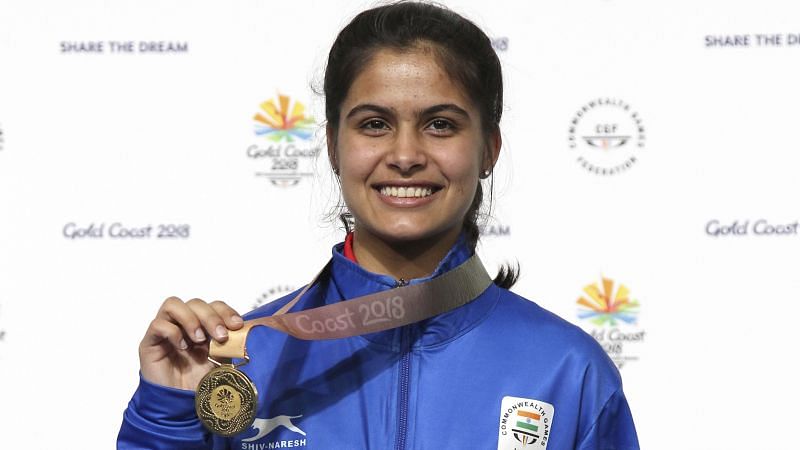 Manu Bhakersporting a smile with the medal around her neck.