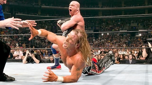 HBK trying evade the Anklelock!