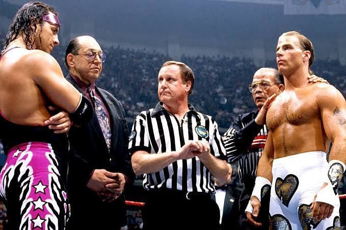 Earl Hebner stating the rules of the match!