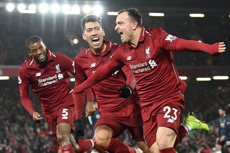 Shaqiri celebrates with Wijnaldum and Firmino after scoring against Manchester United
