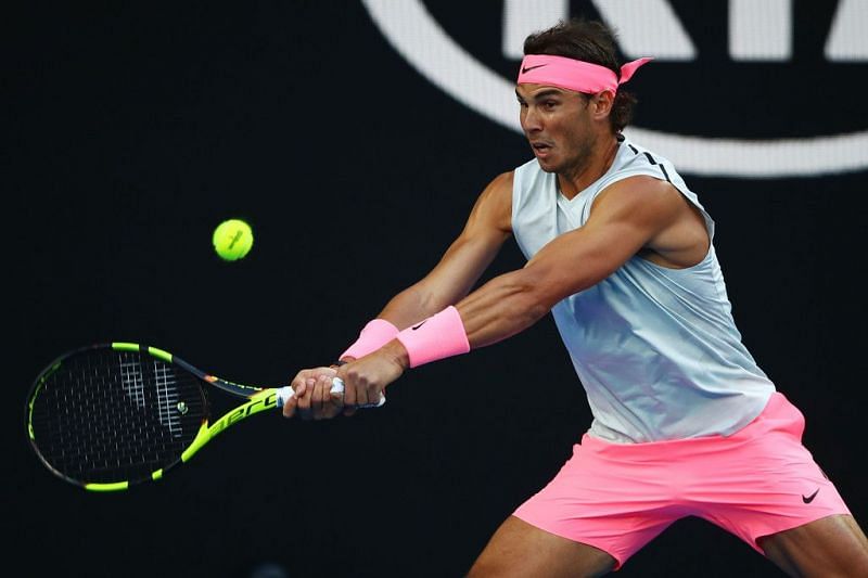 Rafael Nadal in a most attractive colored tennis outfit
