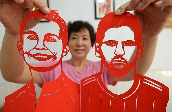 Folk Artist Makes Paper-cut Work For 2018 FIFA World Cup In Handan