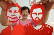 Folk Artist Makes Paper-cut Work For 2018 FIFA World Cup In Handan