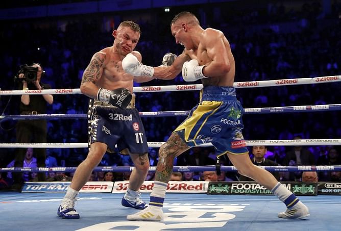 Warrington retains featherweight title beating Frampton