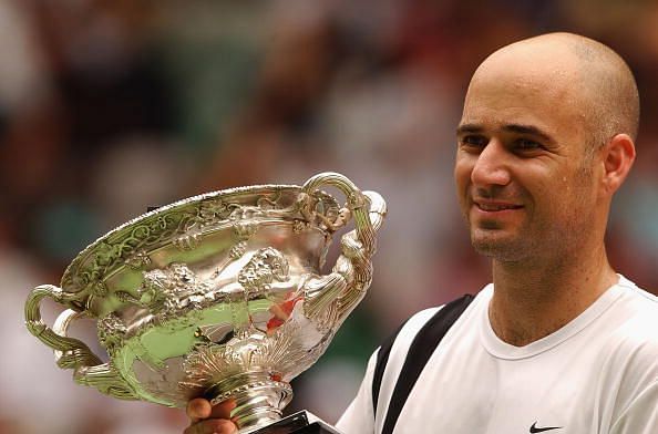 Andre Agassi with the 2003 Australian Open trophy - the last of his 8 Grand Slams