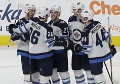 Ehlers scores hat trick to lead Jets past Sharks 5-3