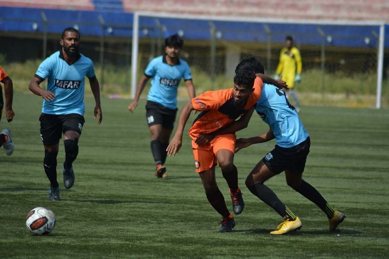 Nidhin of South United FC tries to skip past opponents
