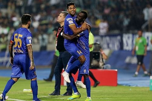 Mumbai players celebrate the team's second goal on the night [Image: ISL]