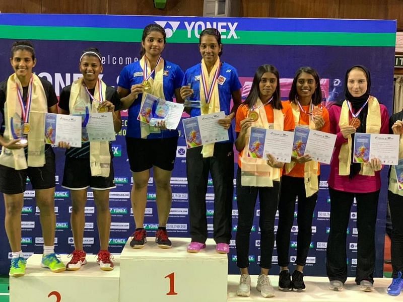 Sruthi KP and Aparna Balan on the top podium with their medals (image courtesy: Aparna Balan Twitter)