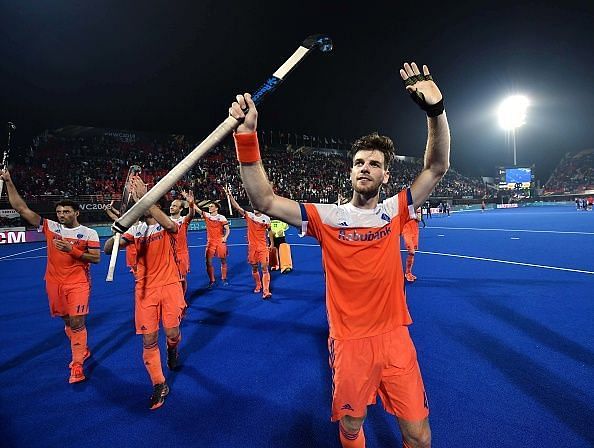The Dutch players acknowledge the crowd at the Kalinga Stadium