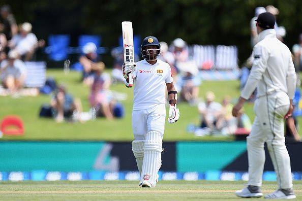 Kusal Mendis acknowledging the applause after scoring a fifty in the second Test against the Kiwis team