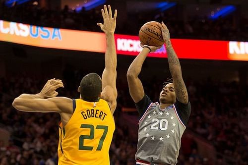 Markelle Fultz tries to shoot over Jazz's centre Rudy Gobert