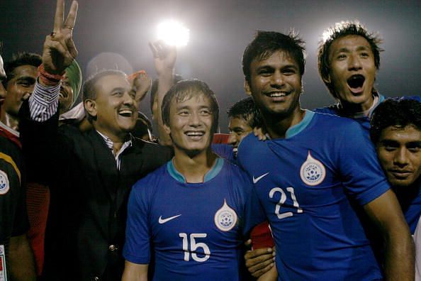 Abhishek Yadav (holding the shoulders of Bhaichung Bhutia) was the target man for India in the 2011 AFC Asian Cup