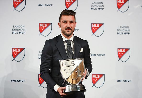 David Villa holding his 2016 MLS MVP award
