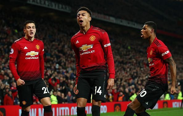 Lingard celebrates his equaliser in front of Stretford End