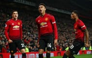Lingard celebrates his equaliser in front of Stretford End
