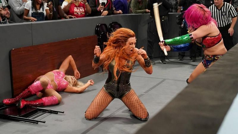 All three women unleashed hell on each other as they hit each other with chairs, kendo sticks and anything else found around the ring