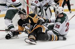 Rust helps Penguins top Wild 2-1