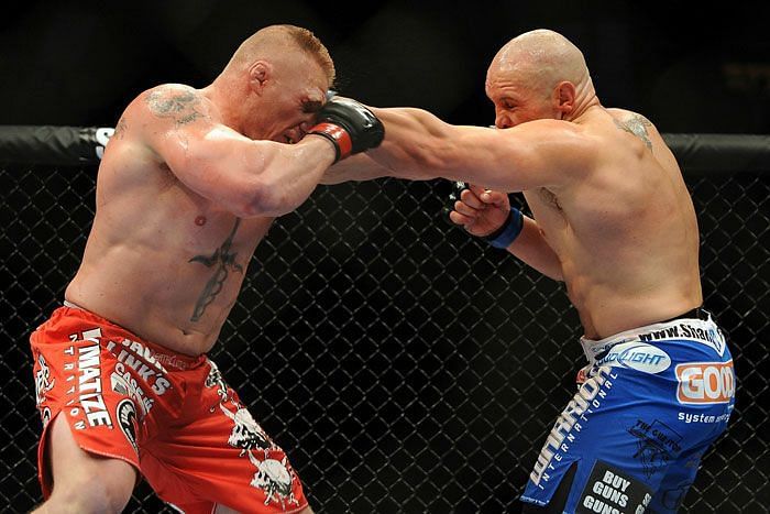 Brock Lesnar and Shane Carwin exchange blows in the classic main event