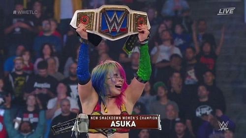 Asuka moments after winning the SmackDown Live Women's Championship at WWE TLC.