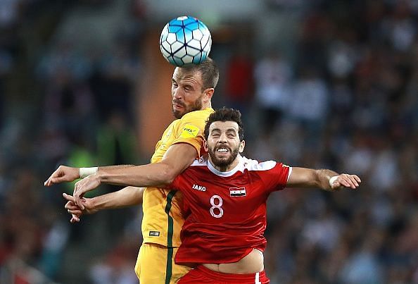 Mahmoud Al Mawas (jersey no 8) in action at Australia v Syria - 2018 FIFA World Cup Asian Playoff: Leg 2