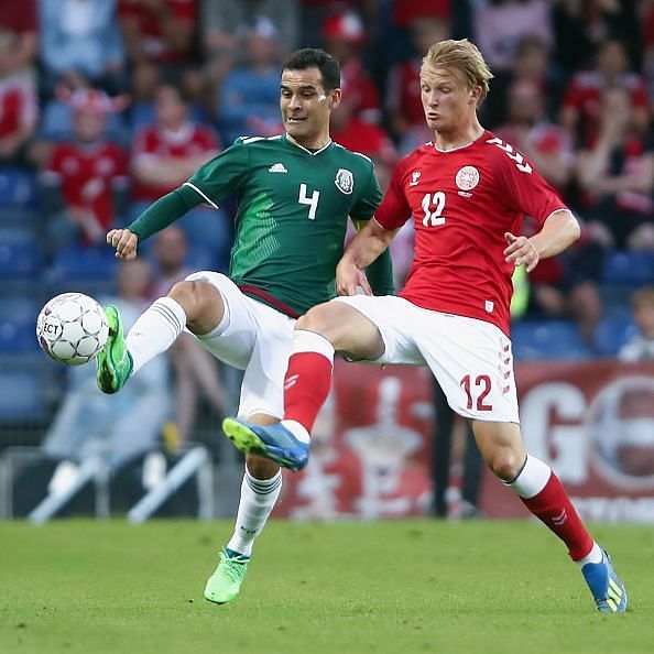 Dolberg (right) in action for Denmark during an international friendly against Mexico