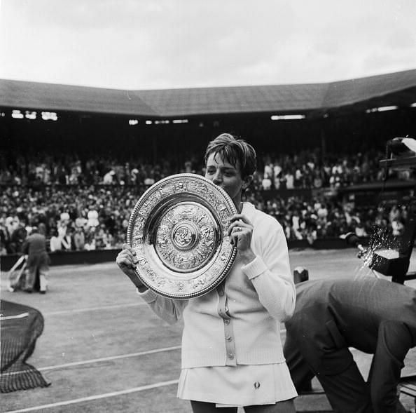 Court On Centre Court lifting the Wimbledon Singles Trophy - 1970