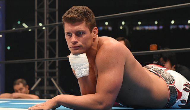 Cody Rhodes taking a breather during a match.