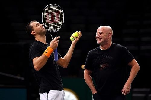 Grigor Dimitrov and Andre Agassi having a ball at the Rolex Paris Masters 2018