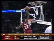 LeBron James Dunking over Tim Duncan
