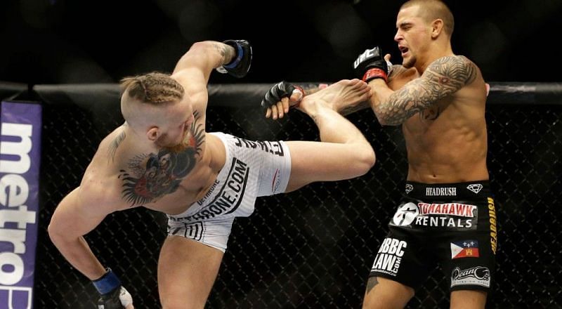 Conor McGregor and Anthony &#039;Showtime&#039; Pettis during their fight at UFC 178!