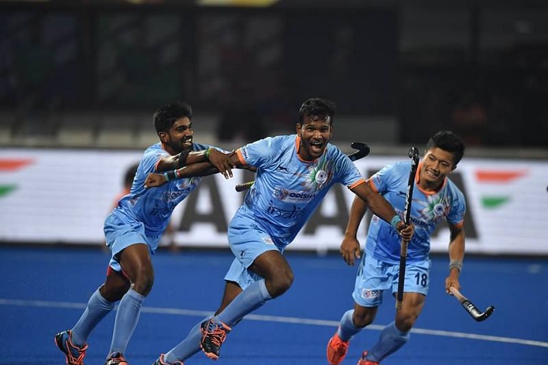 Jubilant Indian players celebrate after a goal