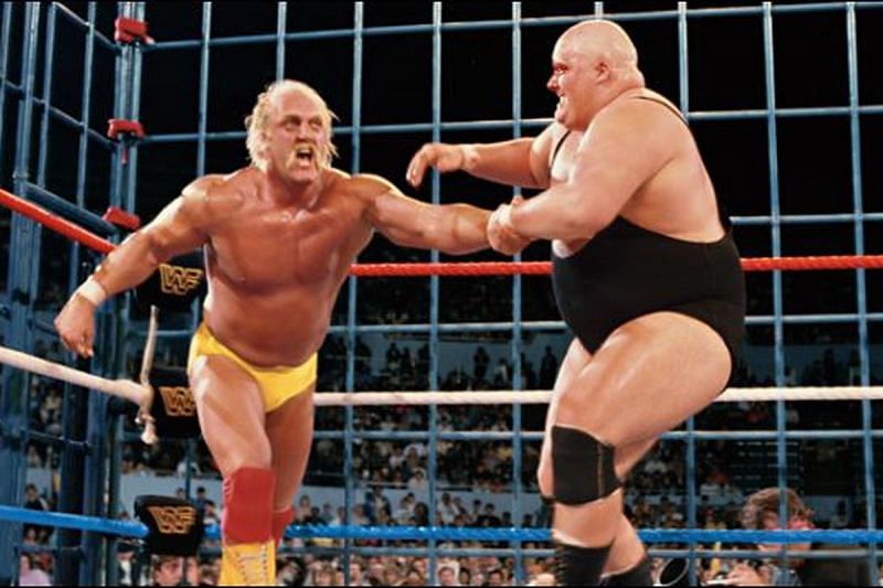 A bloodied King Kong Bundy Irish whips Hulk Hogan in their steel cage match from Wrestlemania II, for the WWE World heavyweight championship