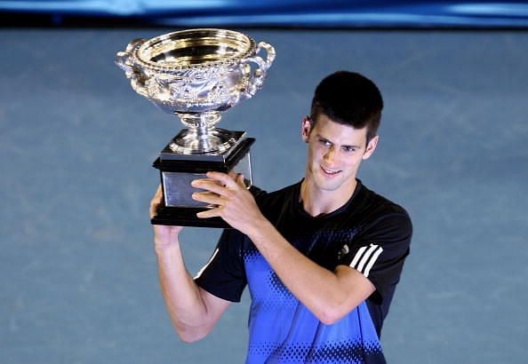 Novak Djokovic celebrates his first Australian Open triumph in 2008