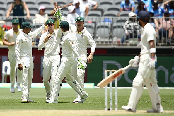 A disappointed Kohli walks back looking bemused.