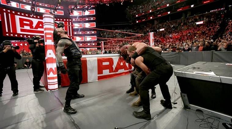 The Shield put Strowman through a table to thwart his cash-in
