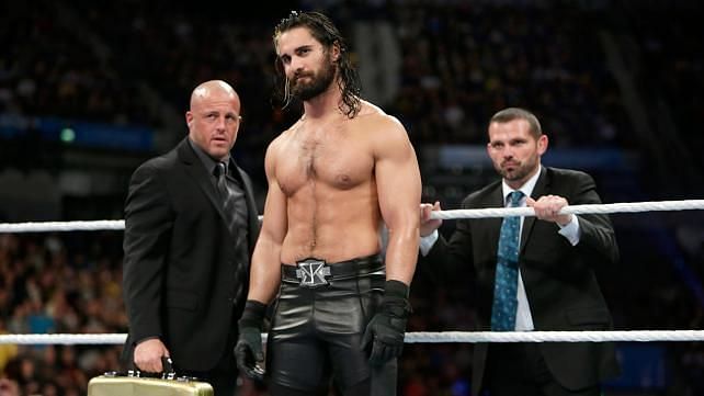 Seth Rollins as a heel working for the Authority flanked by his &#039;bodyguards&#039; J and J Security