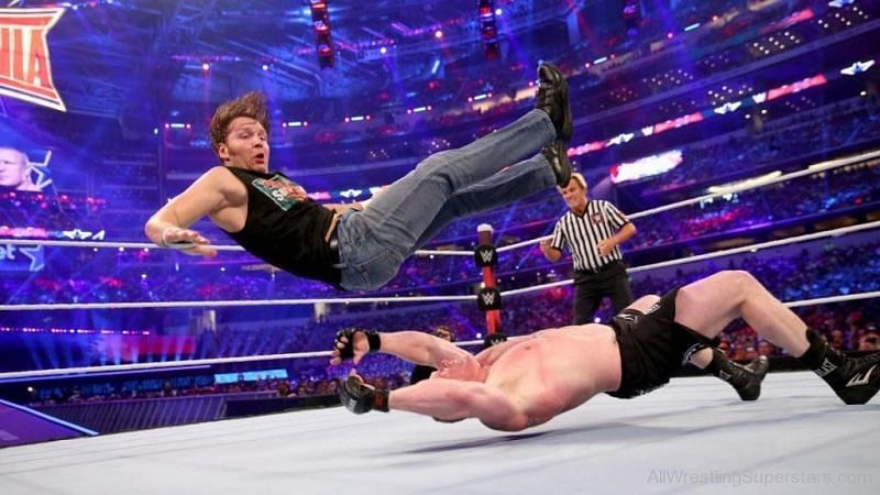 The Beast sends Ambrose flying with a German Suplex