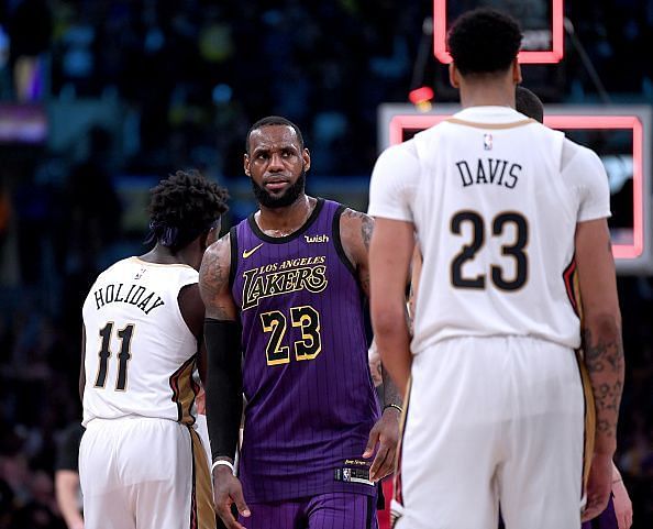 Jrue Holiday, LeBron James and Anthony Davis