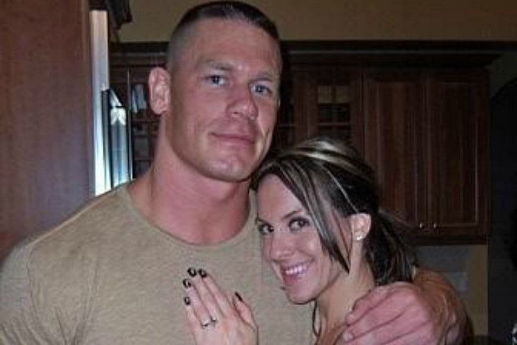 \John Cena pictured her with his previous wife Elizabeth during the happier times of their relationship.