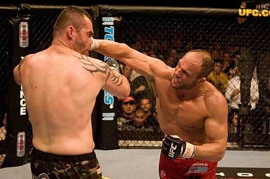 Randy Couture smashes Tim Sylvia with a big time right hand