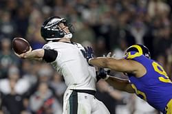Back in the game: Foles leads Eagles past Rams 30-23