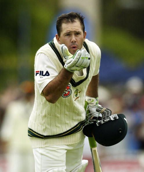 Kiss of the punter: Ponting after reaching the three-figure mark