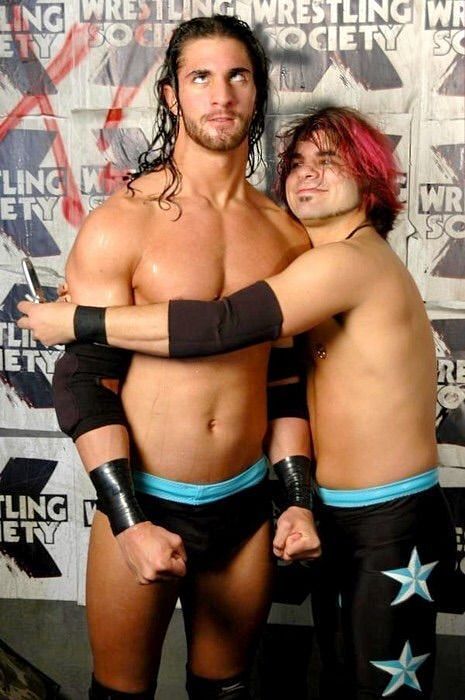 Seth Rollins rolls his eyes at the PDA by tag partner Jimmy Jacobs in his pre-WWE days.